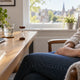 Adult taking a quiet five-minute pause beside a glass of water and timer